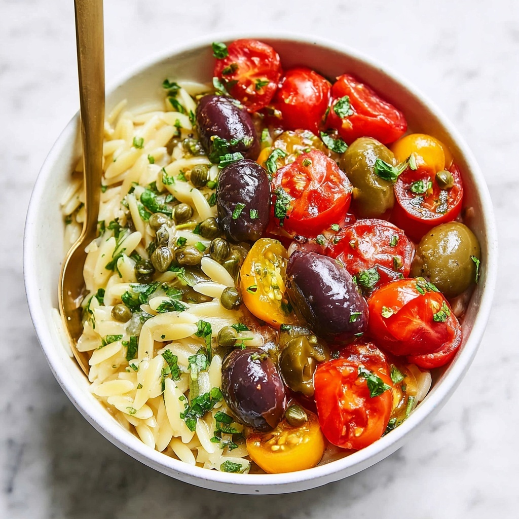 Orzo Pasta Salad with Cherry Tomatoes, Artichokes, Olives, and Chicken Recipe - Recipe Image