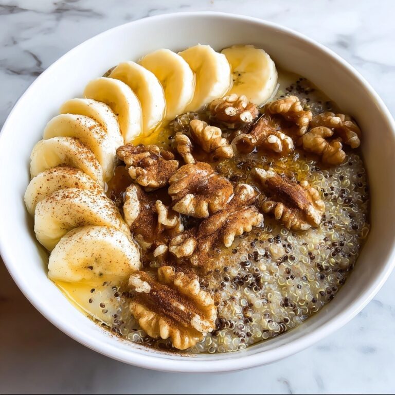 Warm Quinoa Breakfast Bowl with Banana, Walnuts, Honey, and Cinnamon Recipe